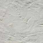 Surface de mur en plâtre avec éclairage naturel
